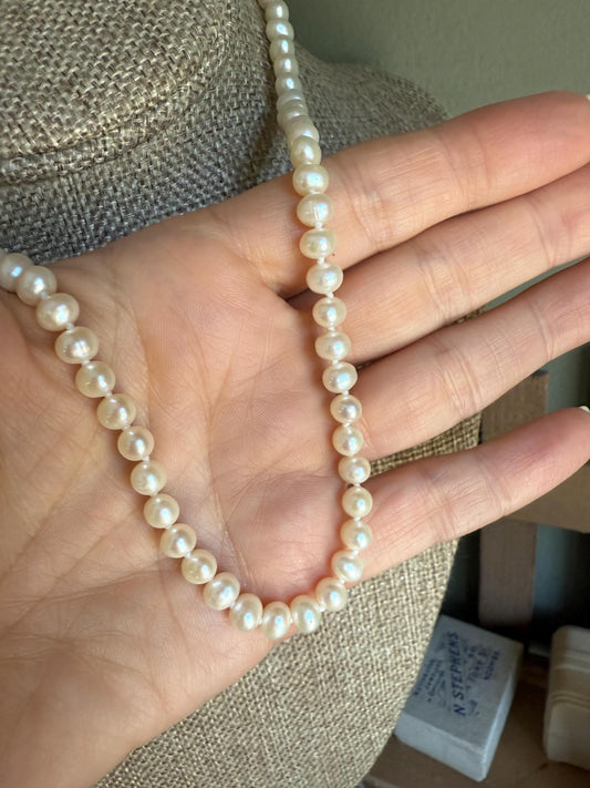 A Strand of Cultured Pearls Hand Knotted with 14K Yellow Gold Clasp