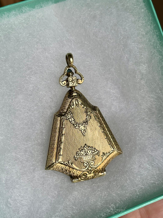 An Fine Edwardian 14K Yellow Gold Engine Turned Locket with Sapphire Cabochon Push Clasp