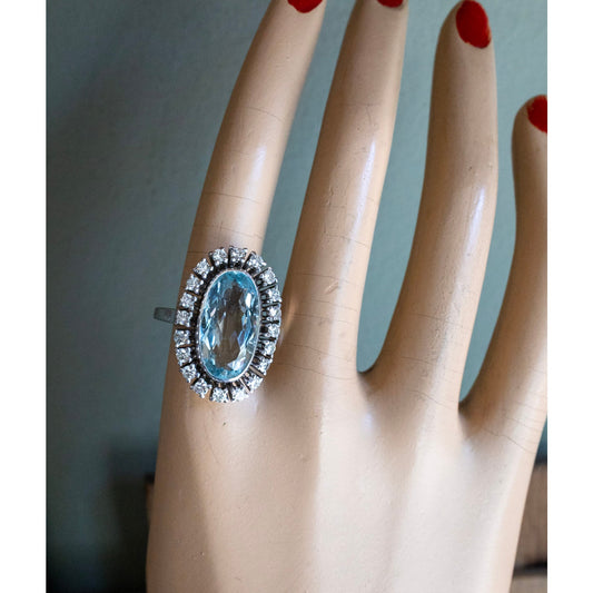Vintage 1950's 18K White Gold Mid-Century Oval Cut Aquamarine and Natural Diamond Halo Ring