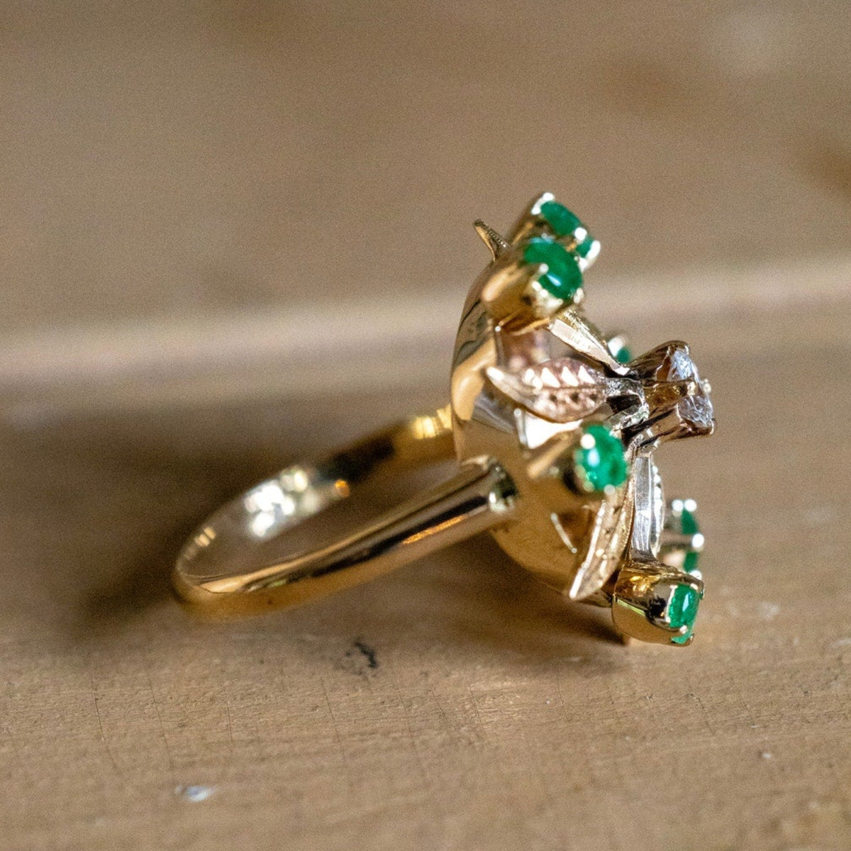 c1960 Vintage 18K Yellow Gold Natural Emerald and Diamond Pinwheel Cocktail Ring