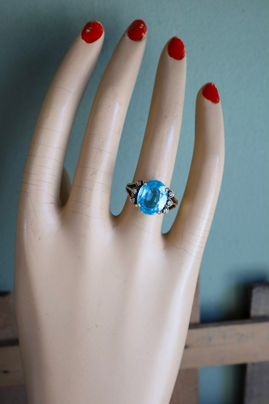 A Mid-Century 14K Yellow Gold Oval Blue Topaz and Diamond Ring