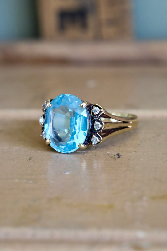 A Mid-Century 14K Yellow Gold Oval Blue Topaz and Diamond Ring