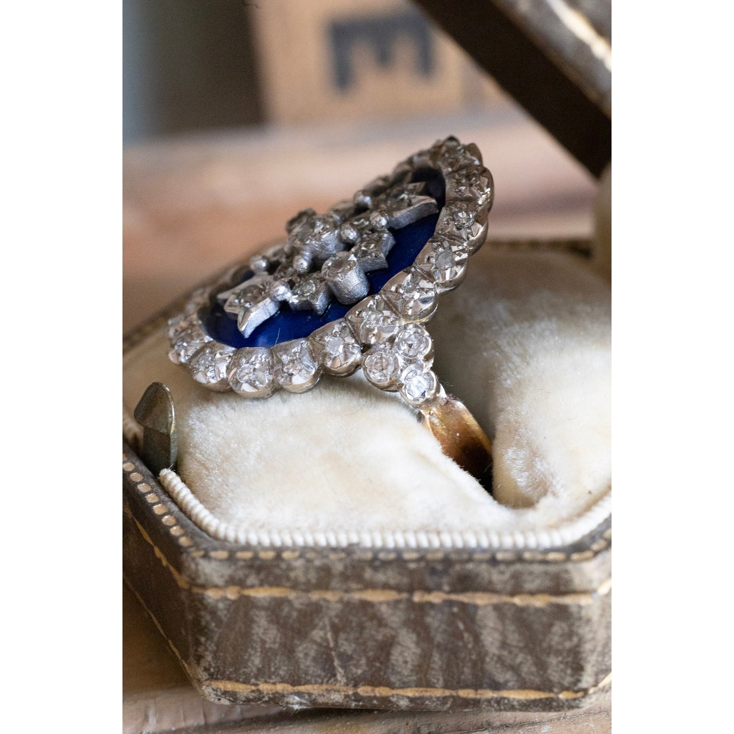 A Georgian Revival 18K English Blue Enamel and Natural Diamond Ring