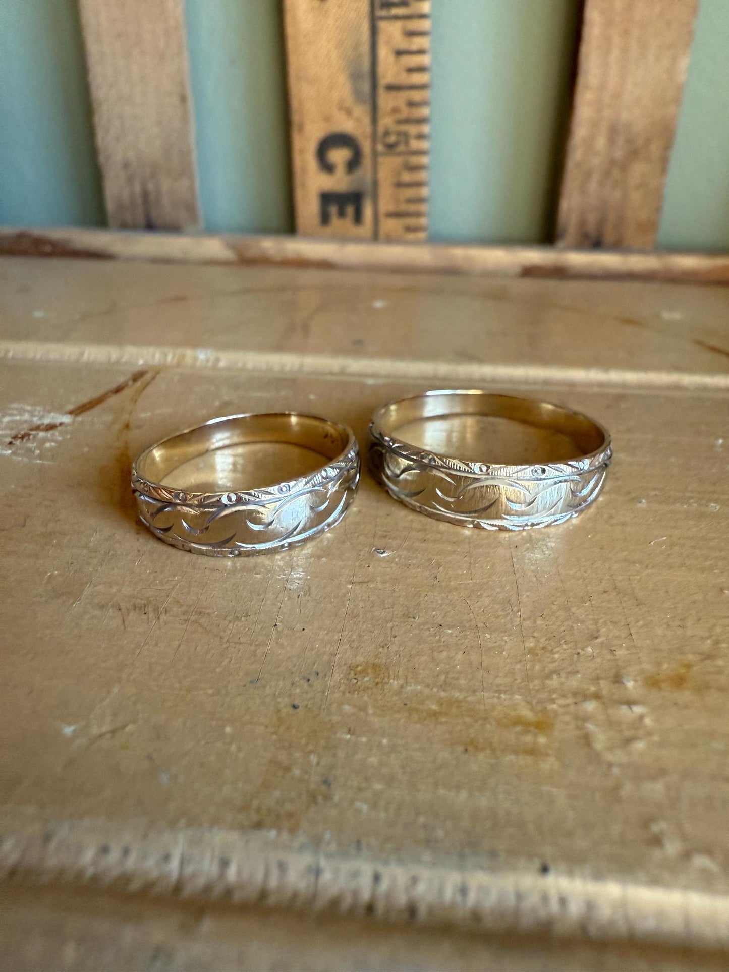 A Rare Matching Mid Century Bi Color 14K Engraved Wedding Bands