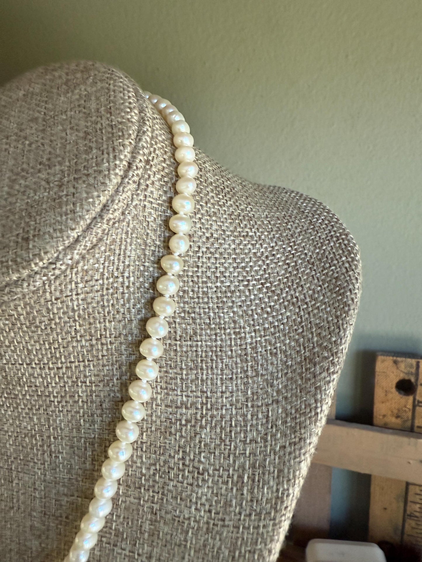A Strand of Cultured Pearls Hand Knotted with 14K Yellow Gold Clasp
