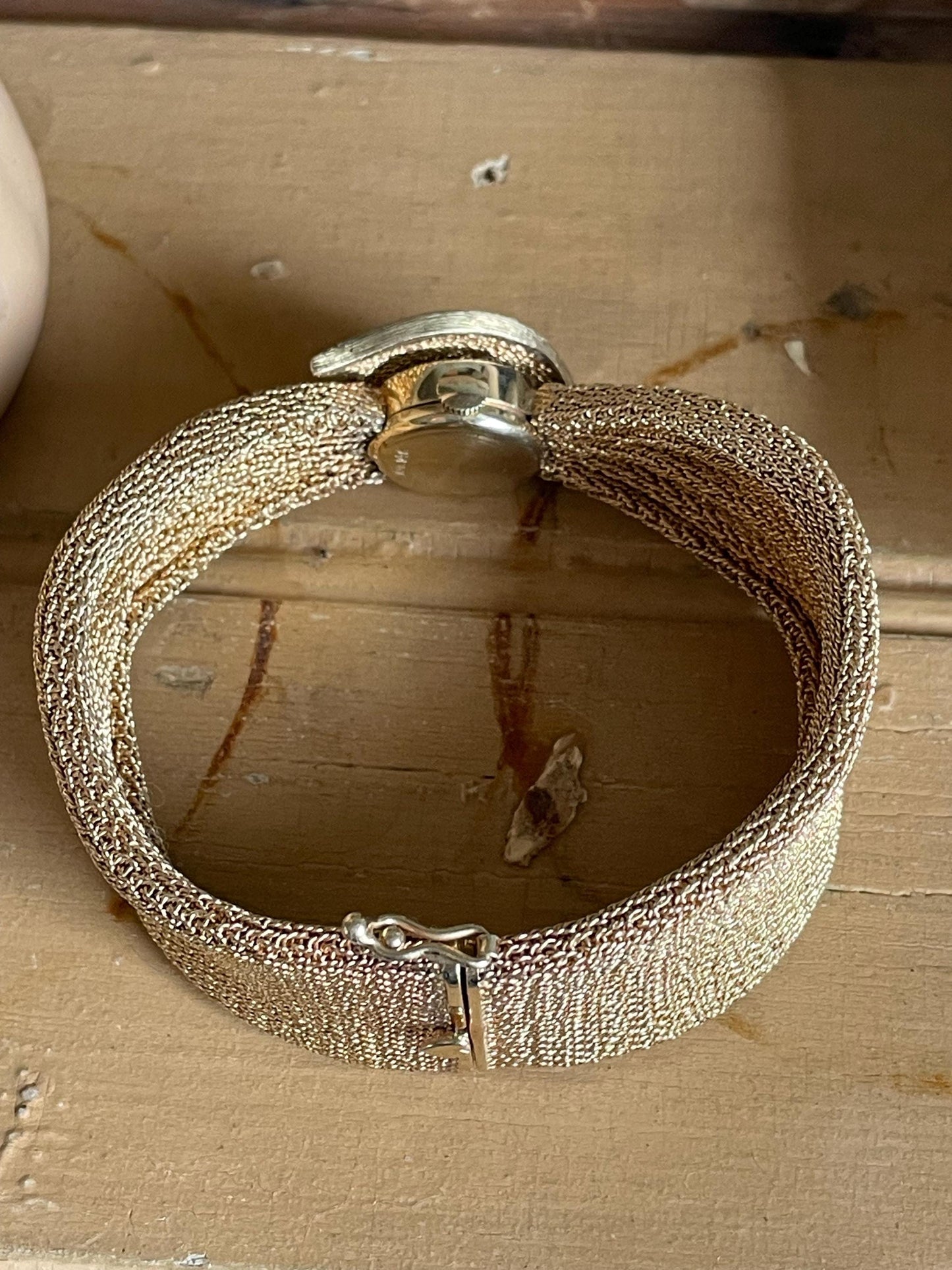 An Exceptional Mid Century Mesh 14K Yellow Gold Longines Surprise Watch