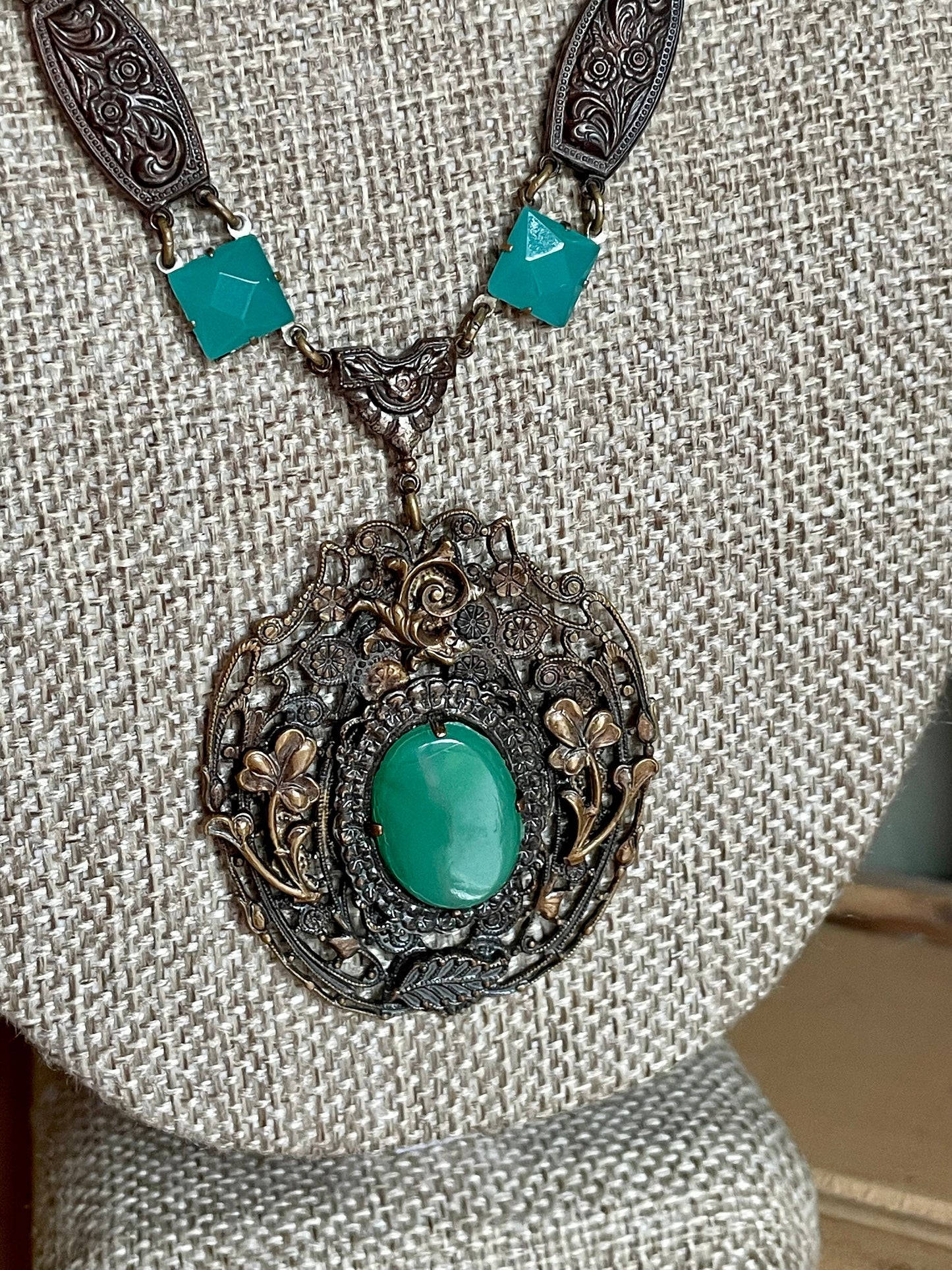 Unusual c1915 Late Edwardian Brass Tone Necklace with Green Faceted Glass