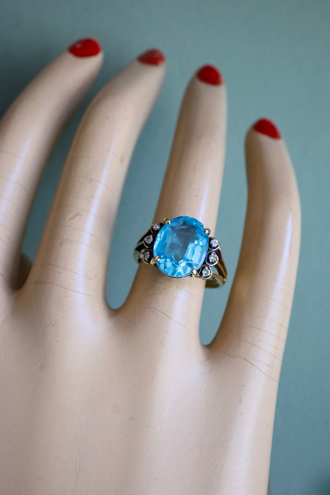 A Mid-Century 14K Yellow Gold Oval Blue Topaz and Diamond Ring