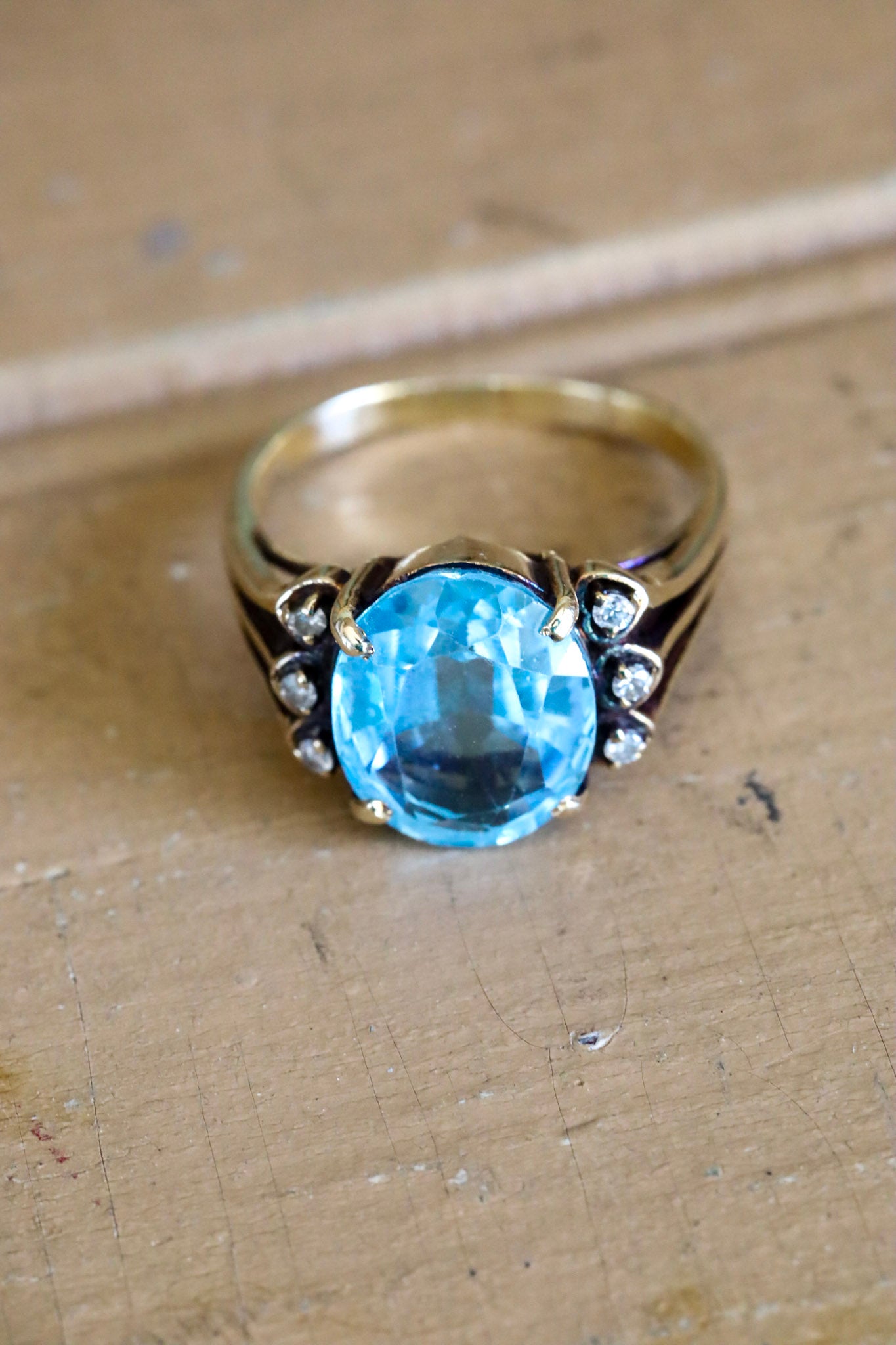 A Mid-Century 14K Yellow Gold Oval Blue Topaz and Diamond Ring
