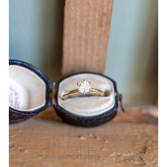 A Classic Vintage Natural Round Brilliant Cut Diamond Ring