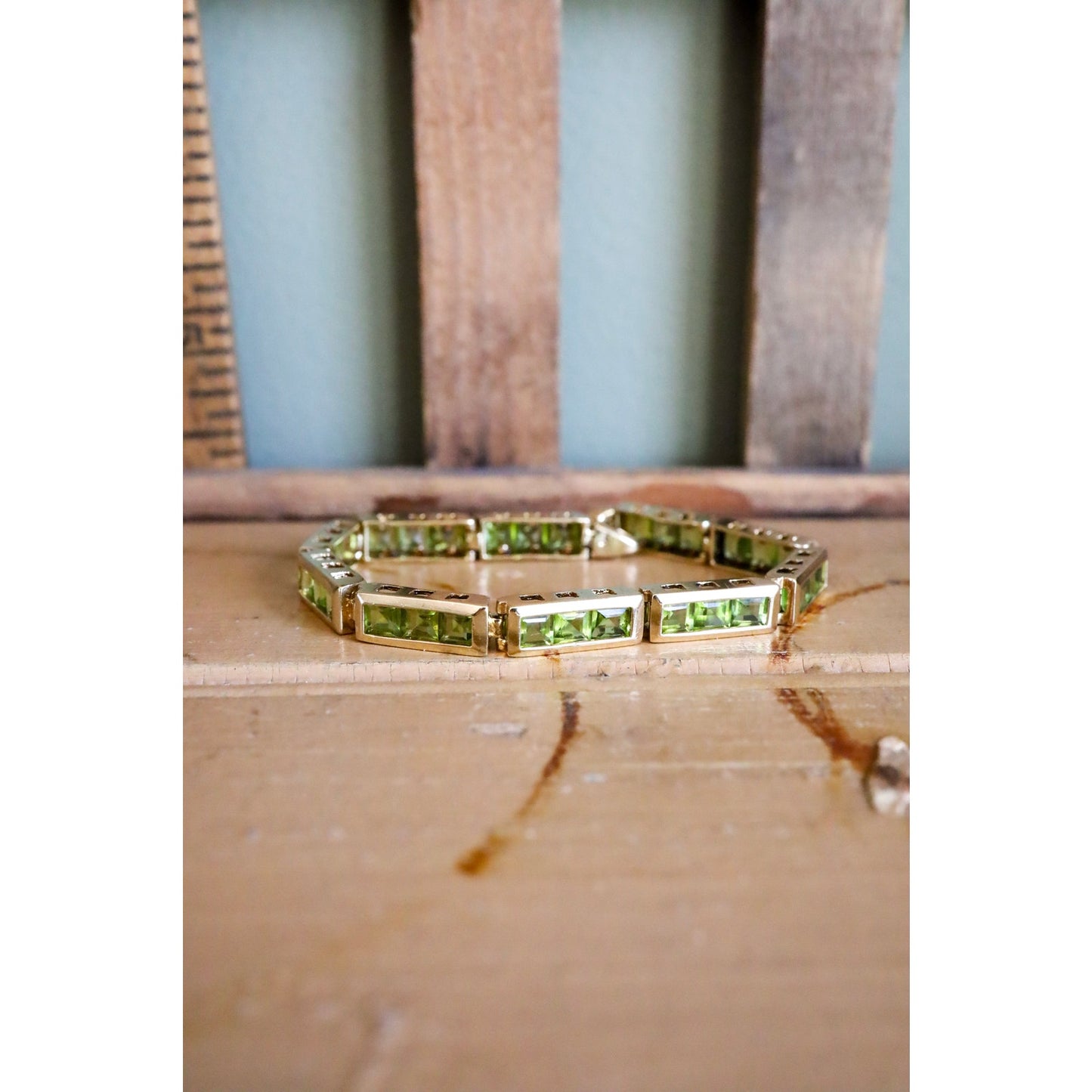 A Vintage 14K Yellow Gold Channel Set Square Set Peridot Bracelet