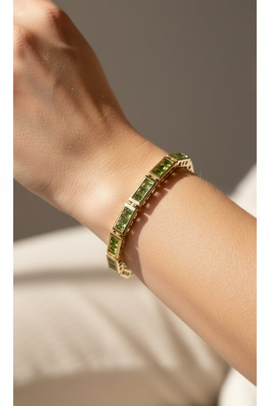 A Vintage 14K Yellow Gold Channel Set Square Set Peridot Bracelet