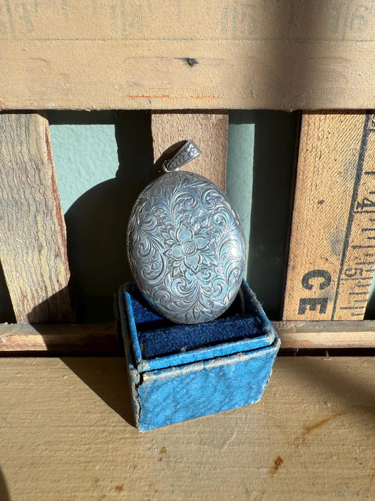 A Vintage Sterling Silver Double Frame Floral and Scroll Engraved Front and Decorative Bale