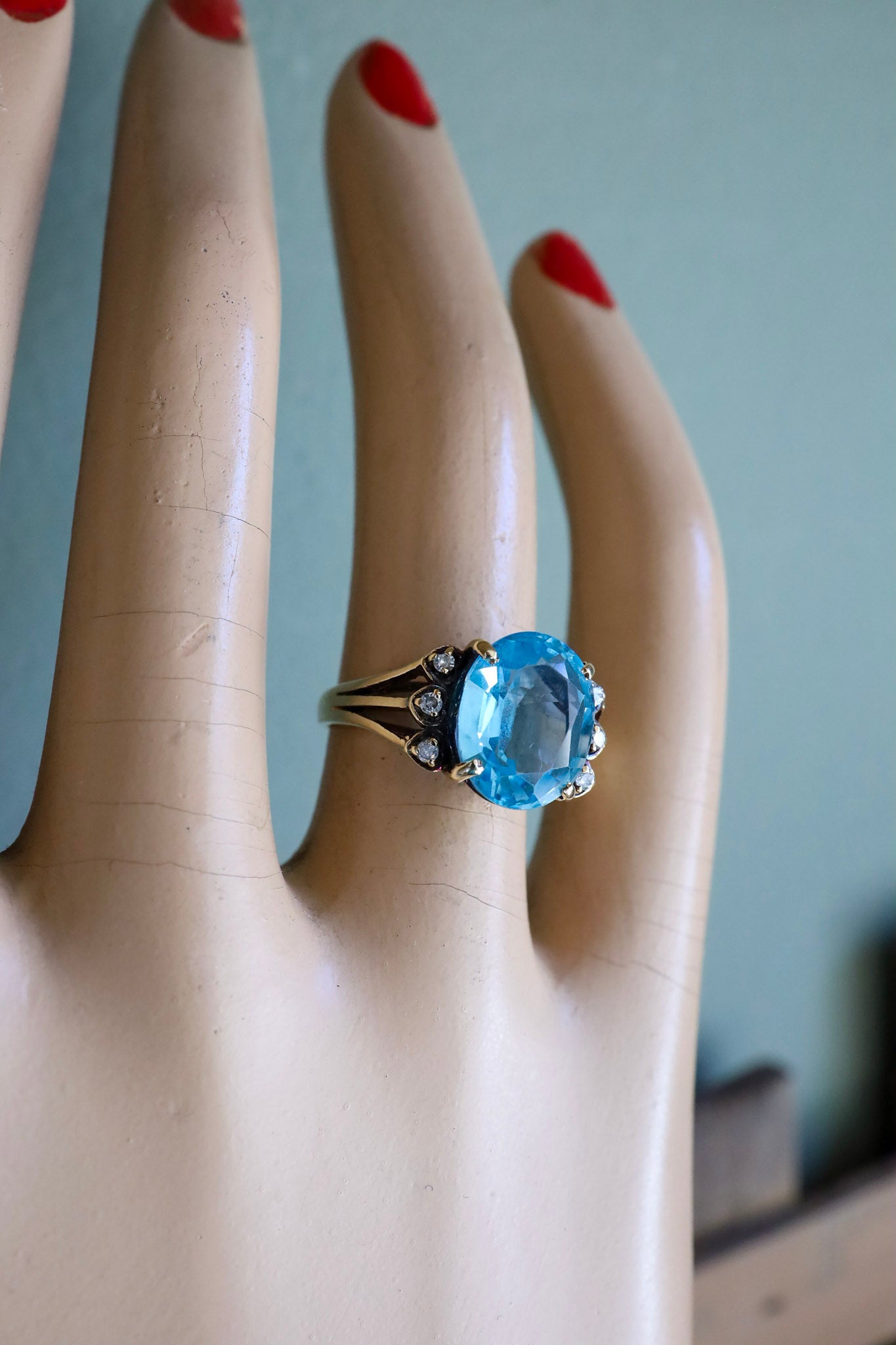 A Mid-Century 14K Yellow Gold Oval Blue Topaz and Diamond Ring