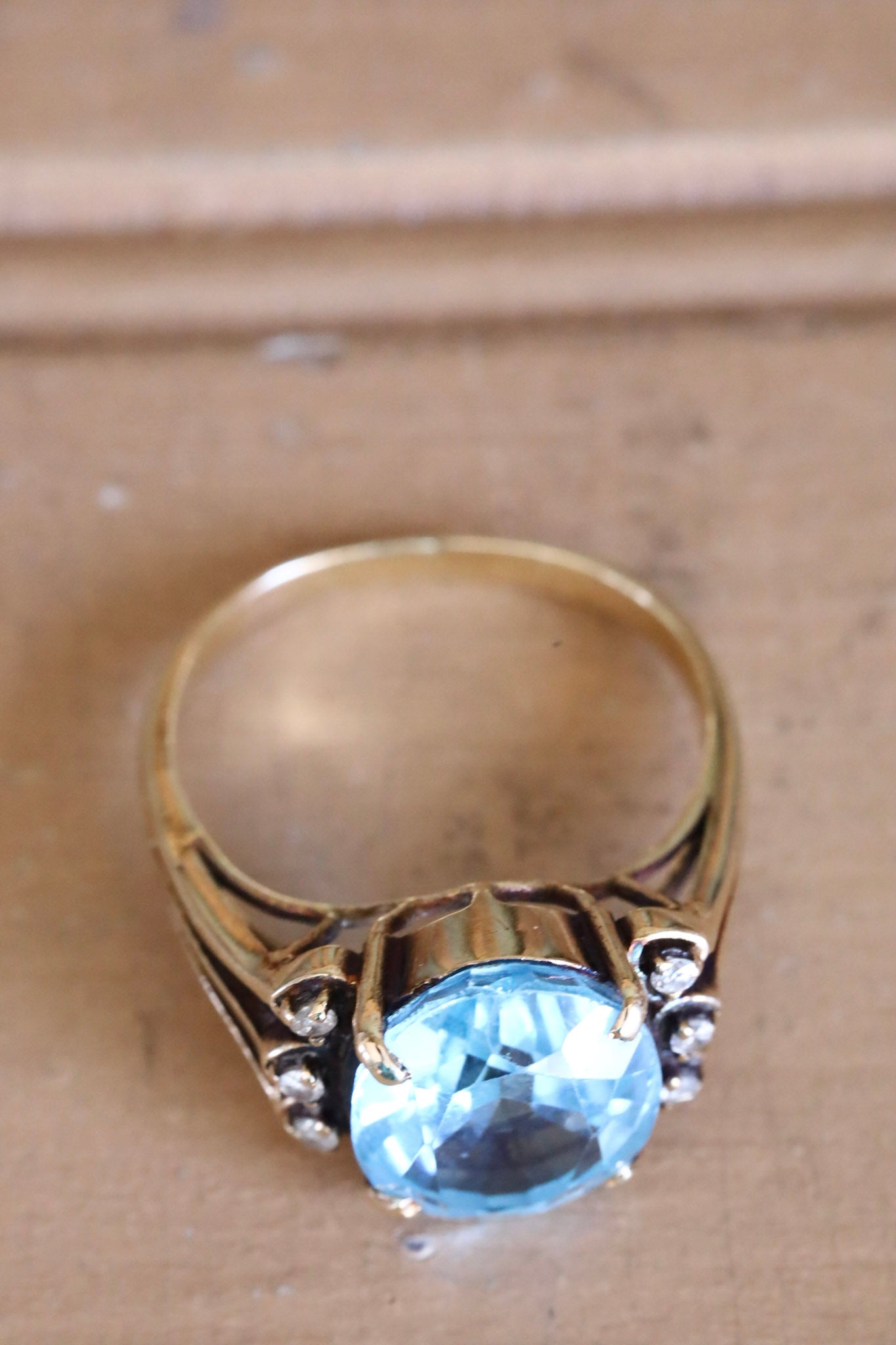 A Mid-Century 14K Yellow Gold Oval Blue Topaz and Diamond Ring
