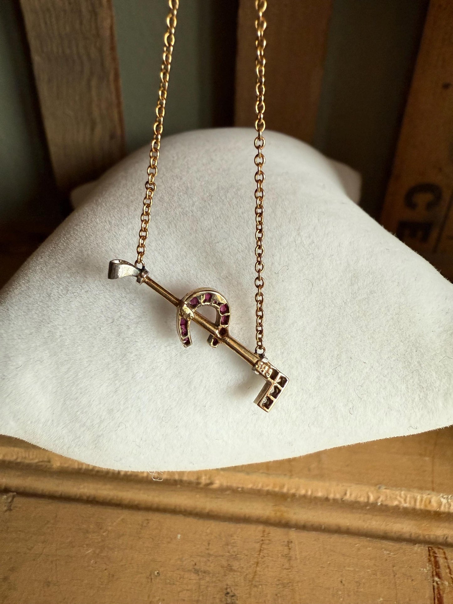 c1930 14K Yellow and White Gold Horse Crop and Lucky Ruby Set Horseshoe Necklace