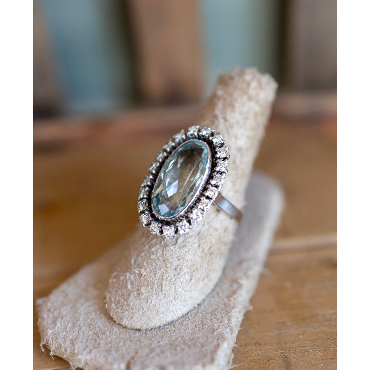 Vintage 1950's 18K White Gold Mid-Century Oval Cut Aquamarine and Natural Diamond Halo Ring