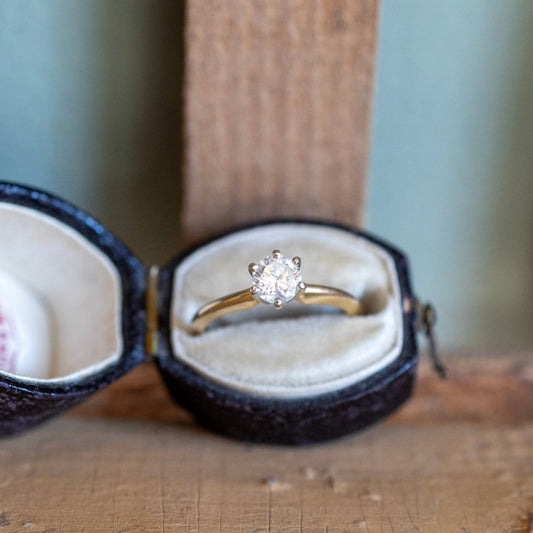 A Classic Vintage Natural Round Brilliant Cut Diamond Ring