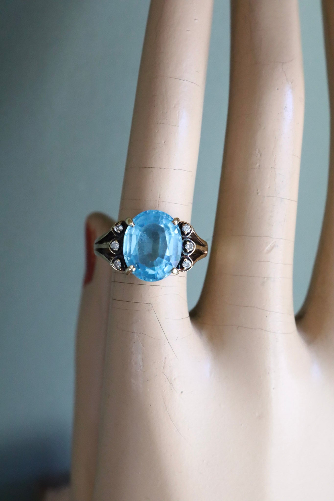 A Mid-Century 14K Yellow Gold Oval Blue Topaz and Diamond Ring