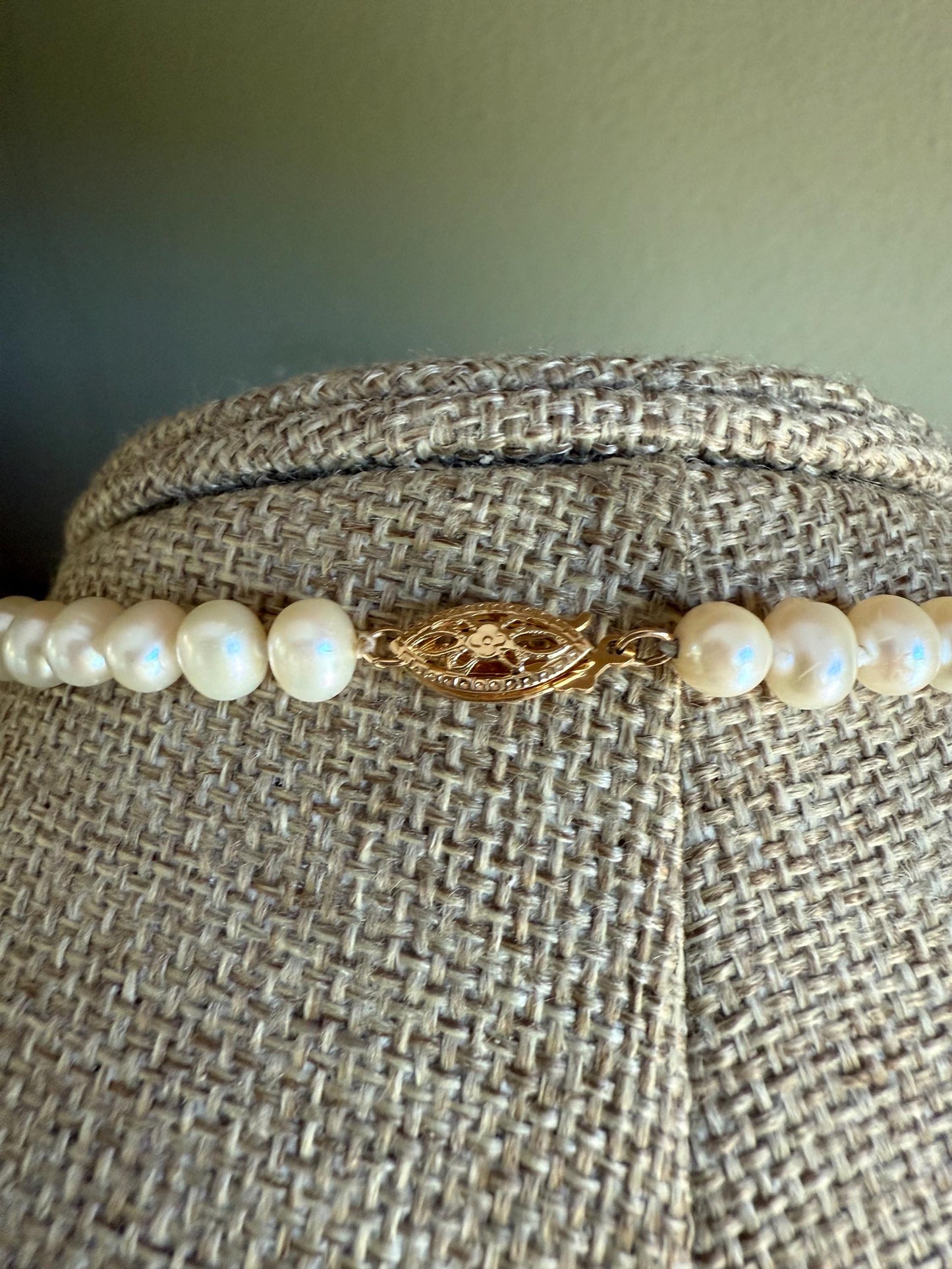 A Strand of Cultured Pearls Hand Knotted with 14K Yellow Gold Clasp