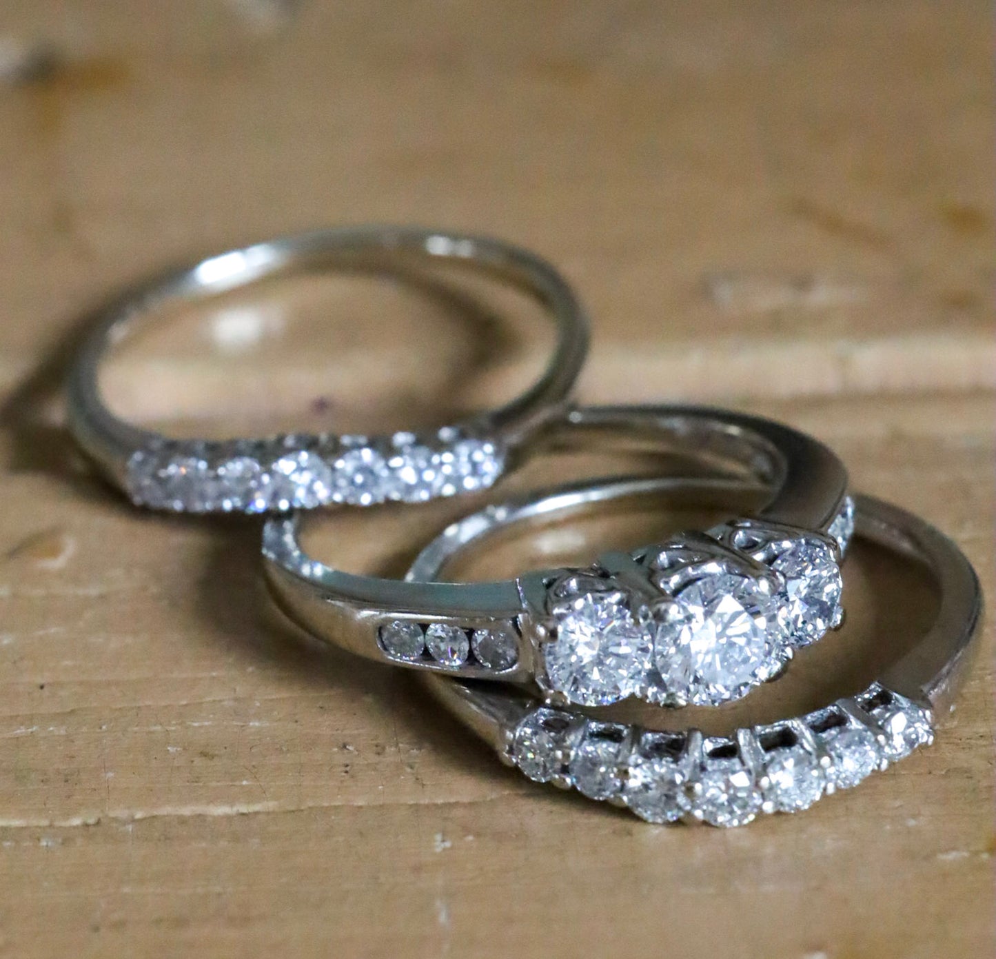 A 14K White Gold Past, Present, Future Natural Diamond Ring with Two Diamond Bands