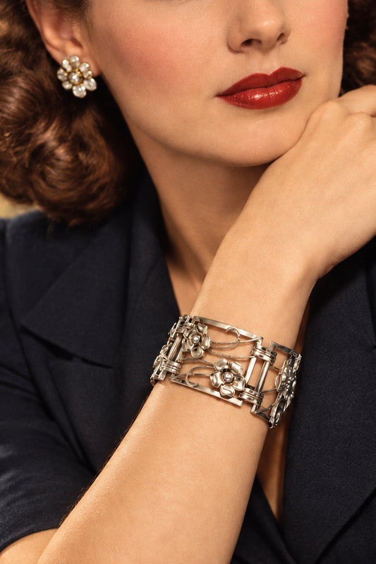 A late 1940's Harry S. Bick & Son Sterling Silver Floral Link Bracelet