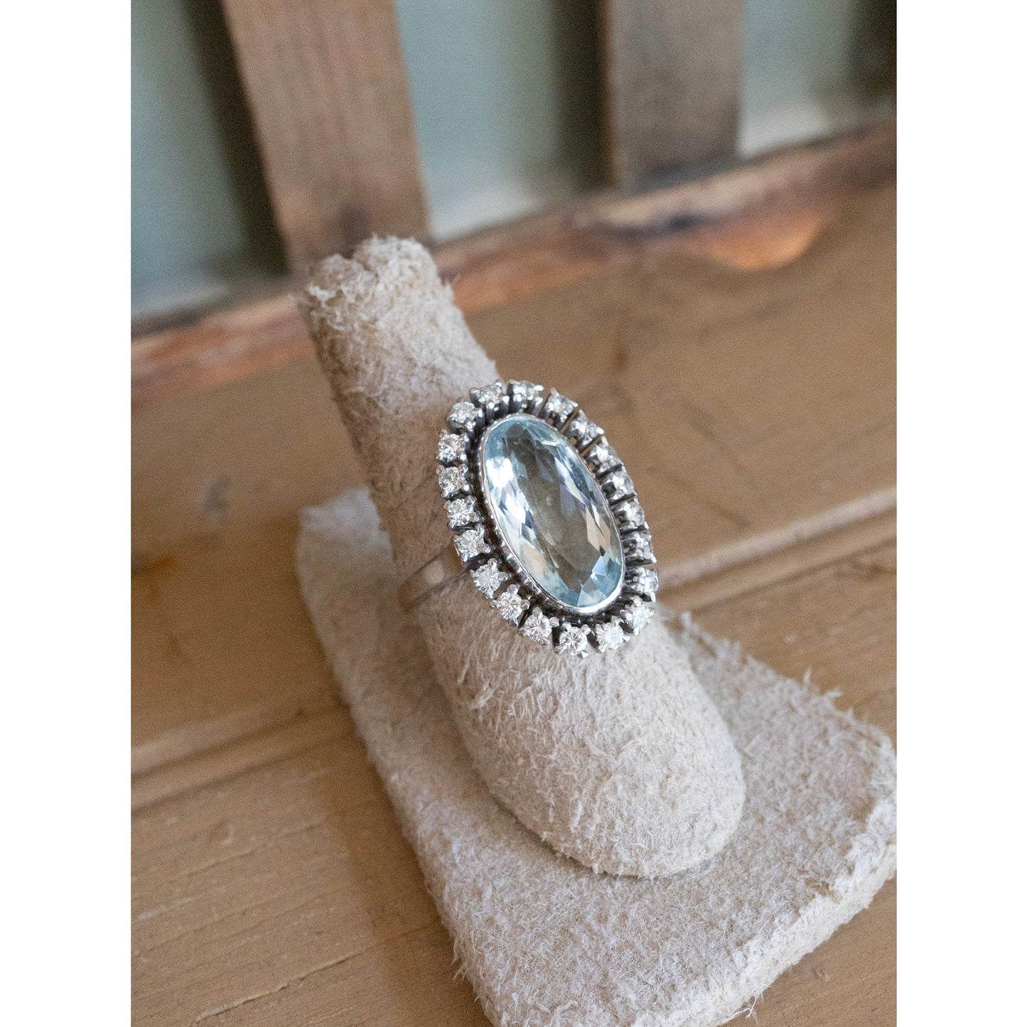 Vintage 1950's 18K White Gold Mid-Century Oval Cut Aquamarine and Natural Diamond Halo Ring