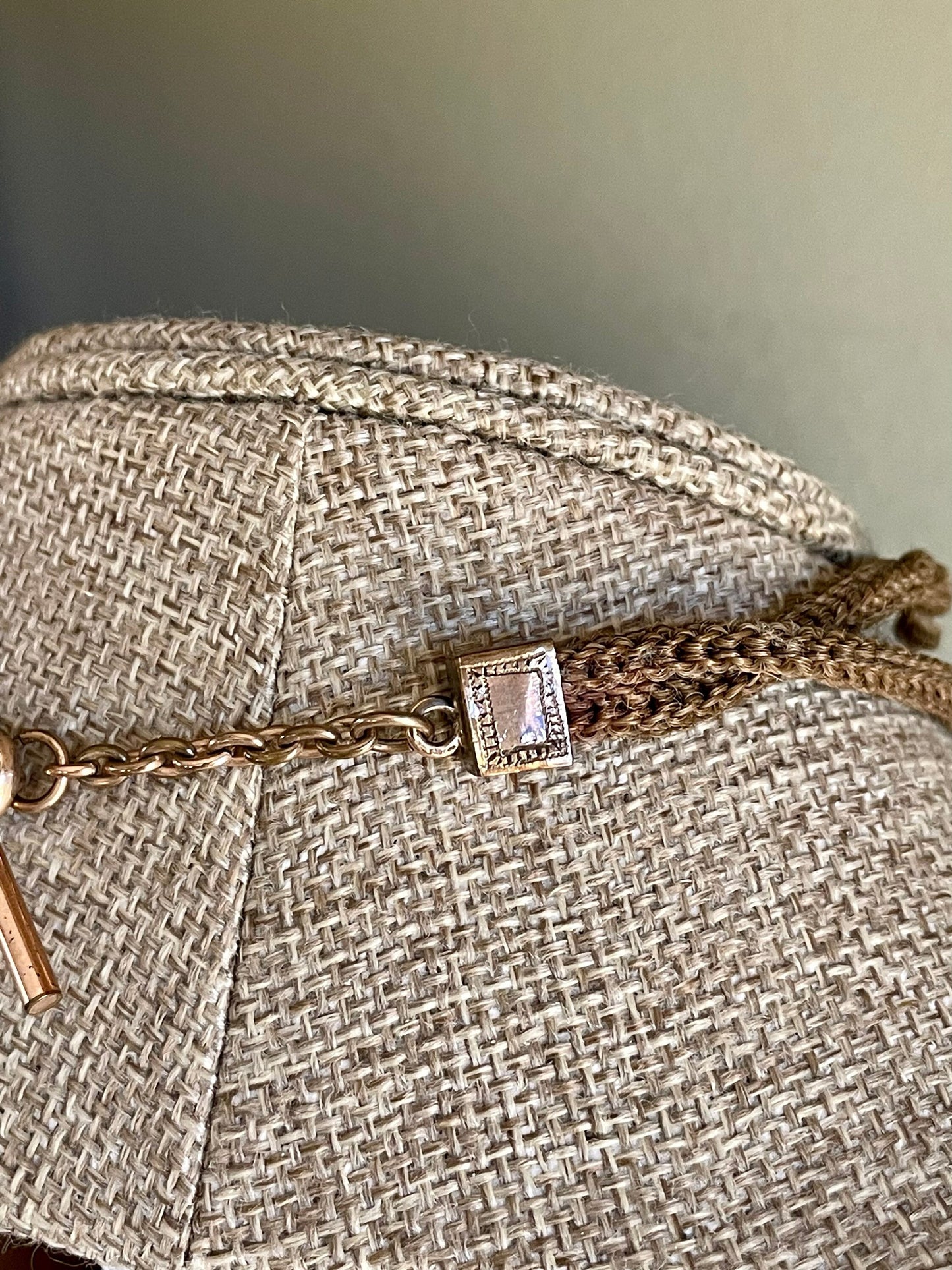 A Victorian Braided Hair Watch Chain with 10K Rose Gold Locket