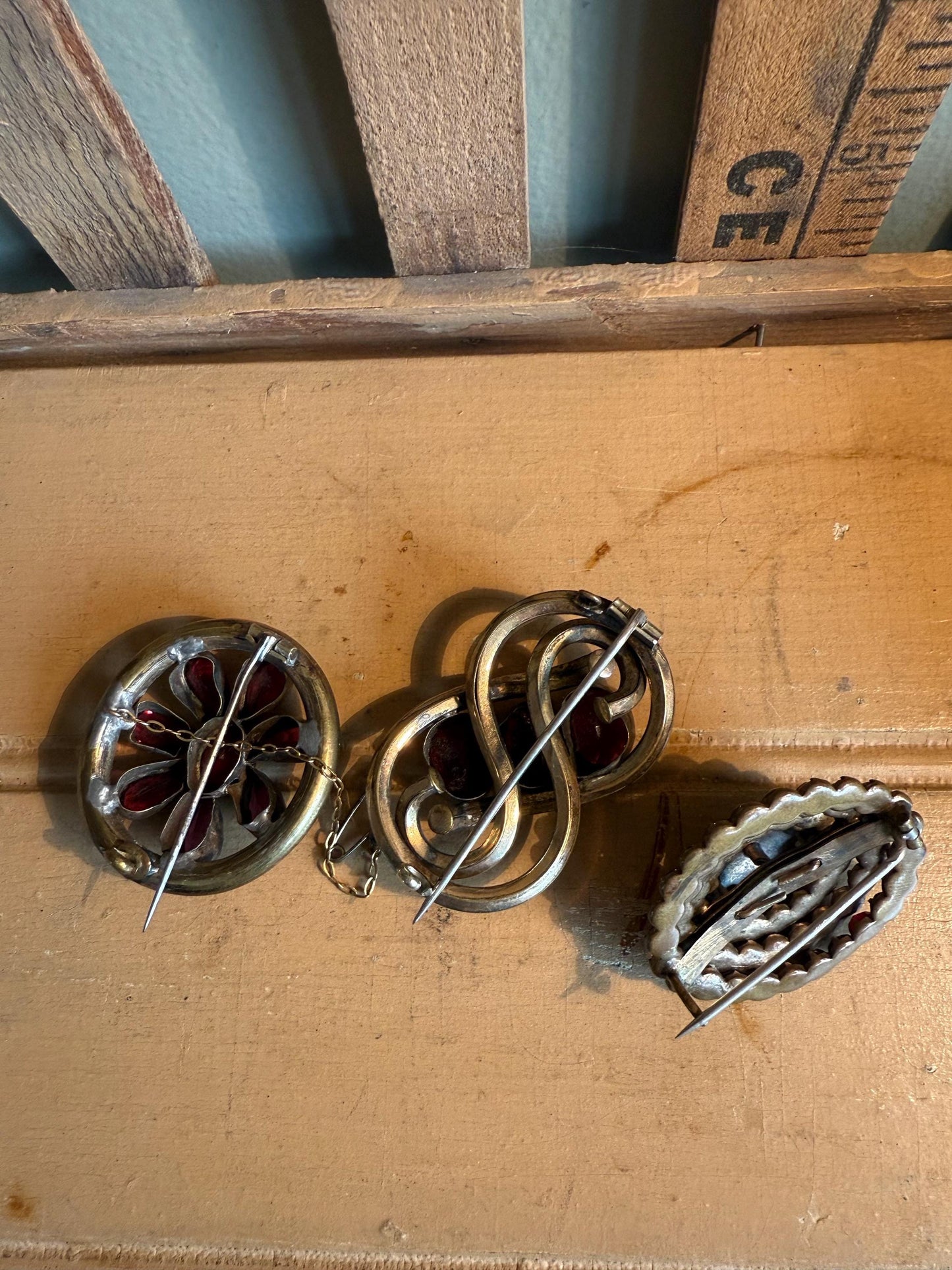 Pick an Antique Victorian Glass Garnet Brooch!