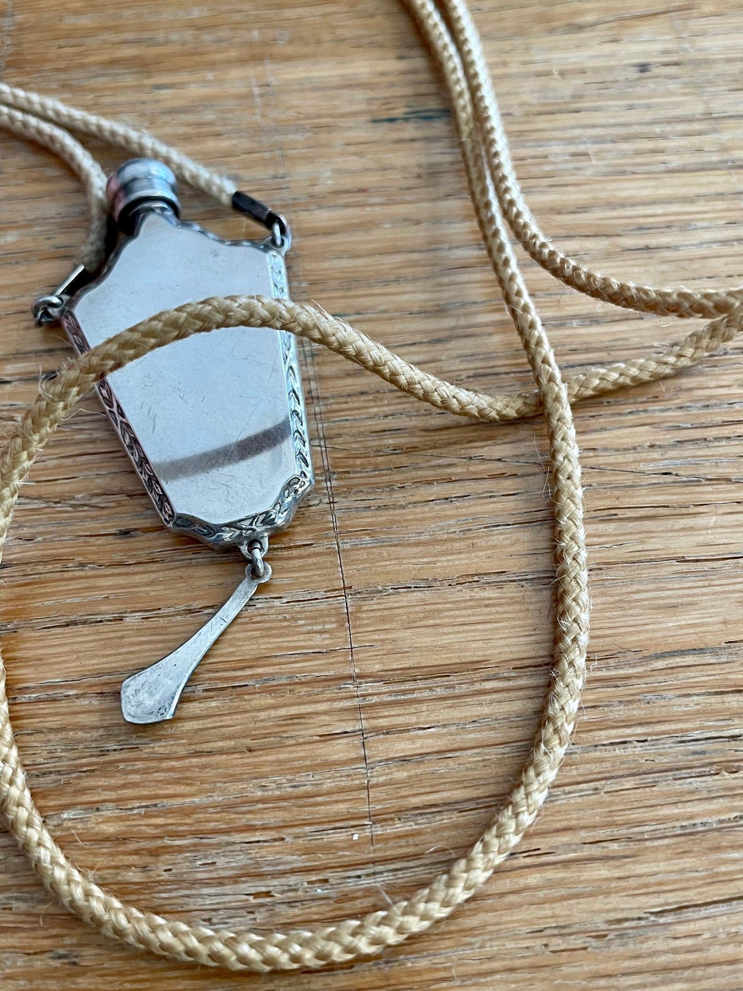 c1920-1930 Sterling Silver Guilloche Perfume Bottle on Original Braided Cord with Slide