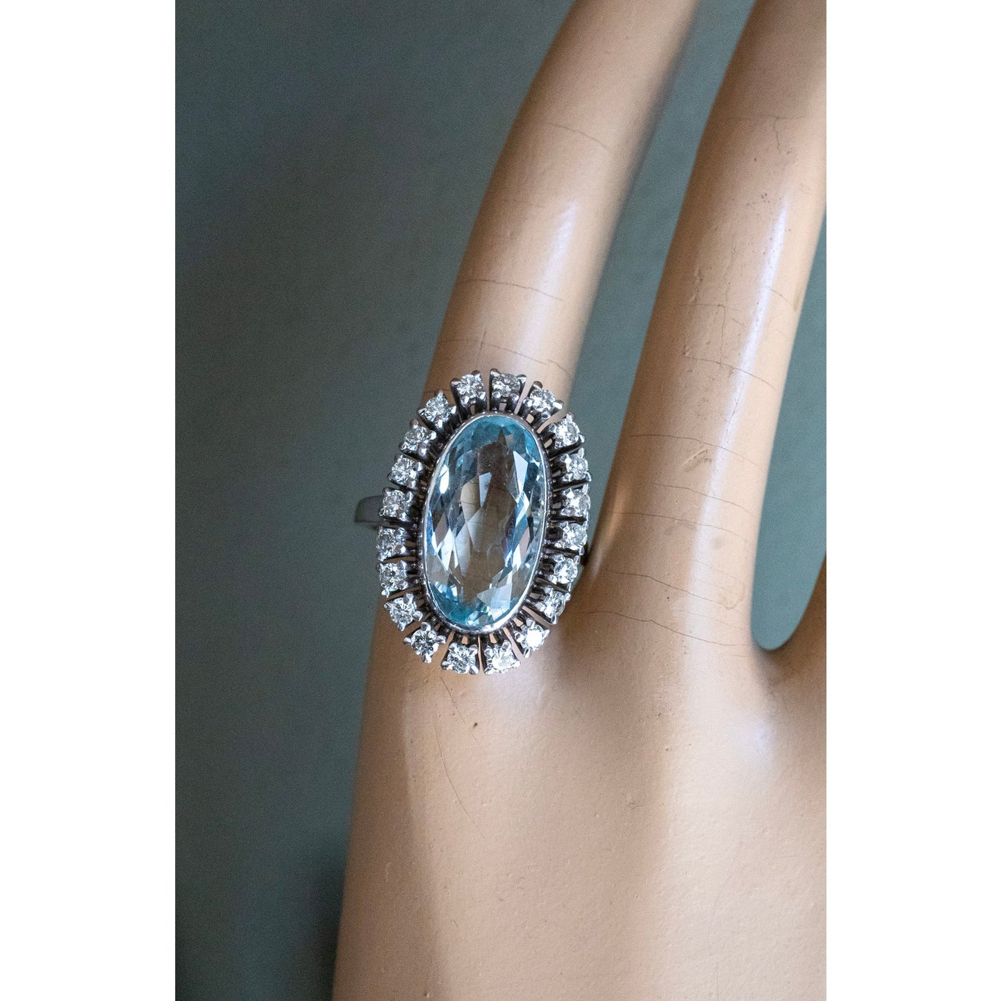 Vintage 1950's 18K White Gold Mid-Century Oval Cut Aquamarine and Natural Diamond Halo Ring