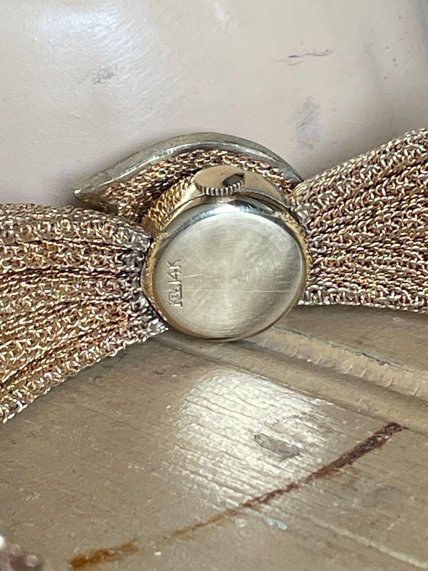 An Exceptional Mid Century Mesh 14K Yellow Gold Longines Surprise Watch