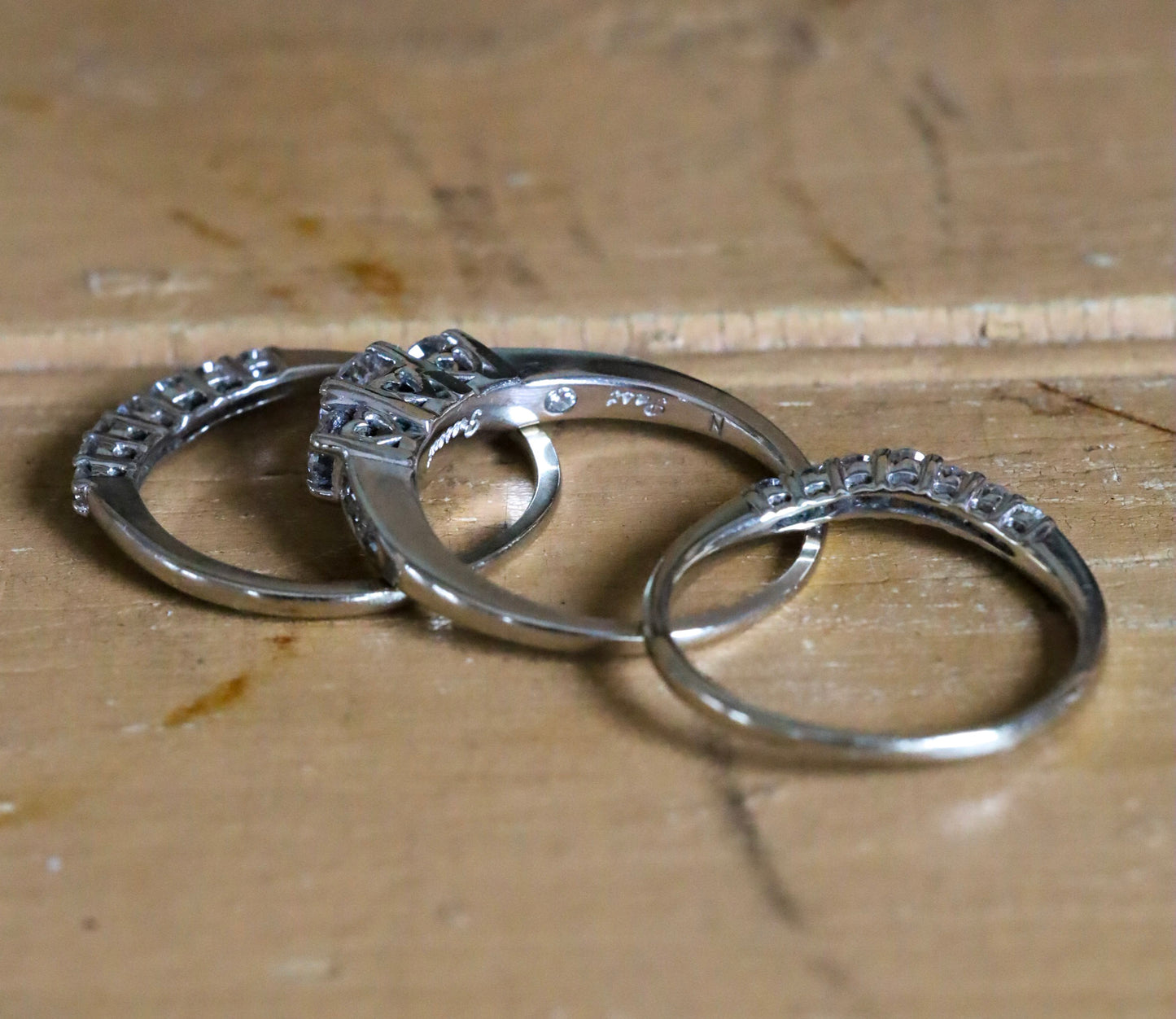 A 14K White Gold Past, Present, Future Natural Diamond Ring with Two Diamond Bands