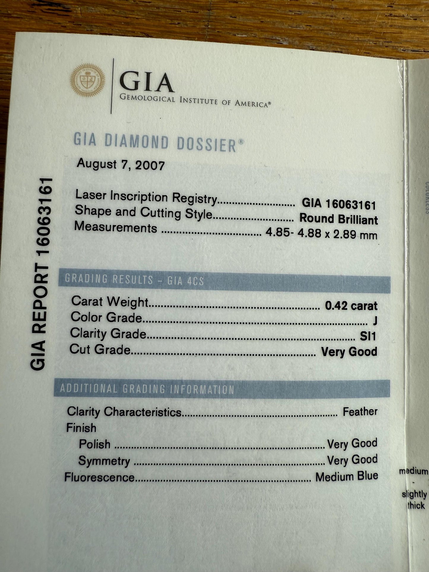 A GIA certified .42 ct Round Brilliant Cut Natural Diamond in 14K White Gold