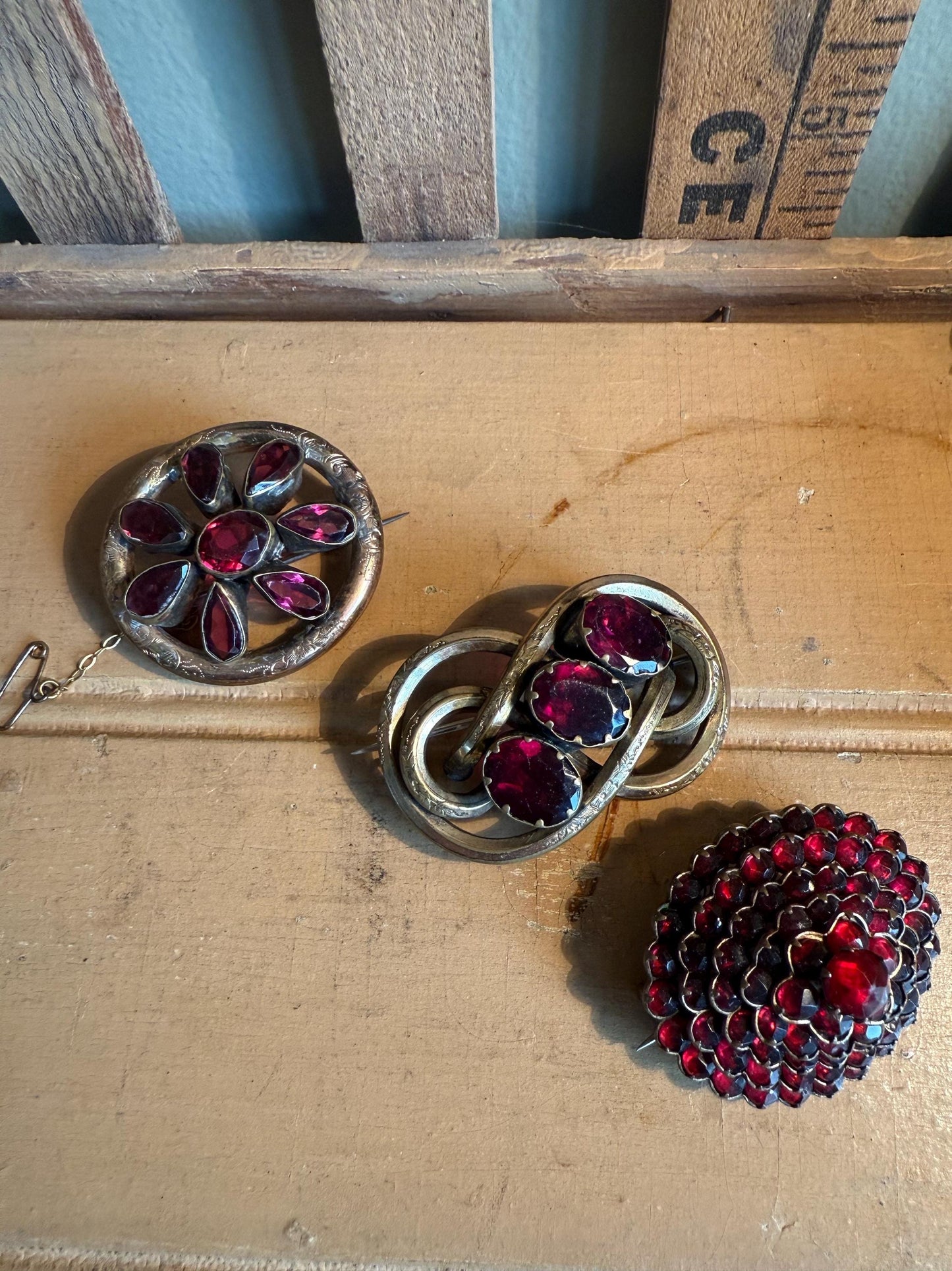 Pick an Antique Victorian Glass Garnet Brooch!