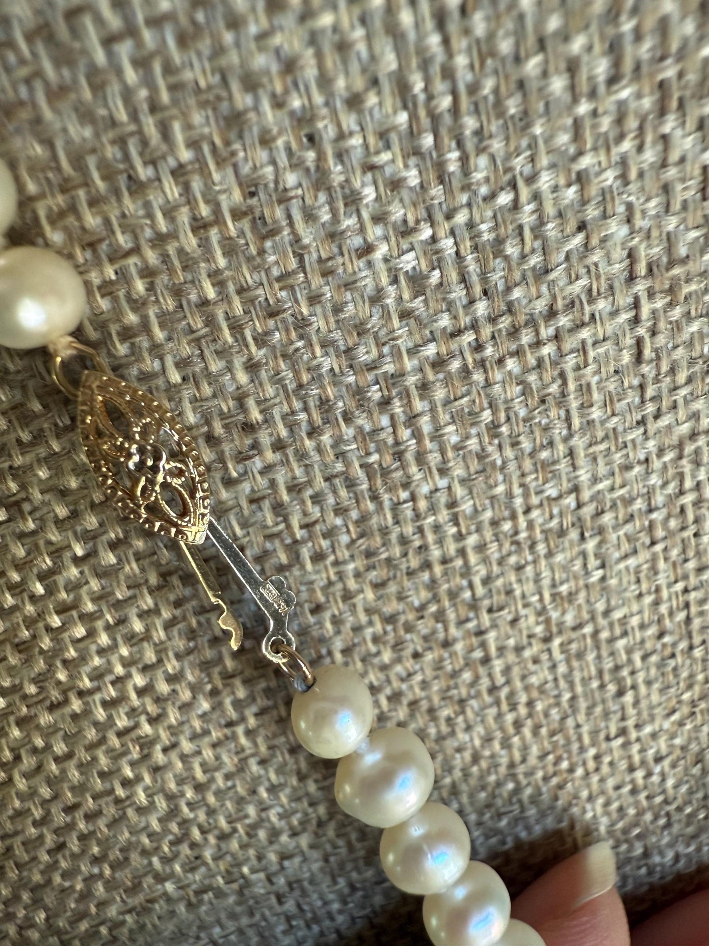 A Strand of Cultured Pearls Hand Knotted with 14K Yellow Gold Clasp