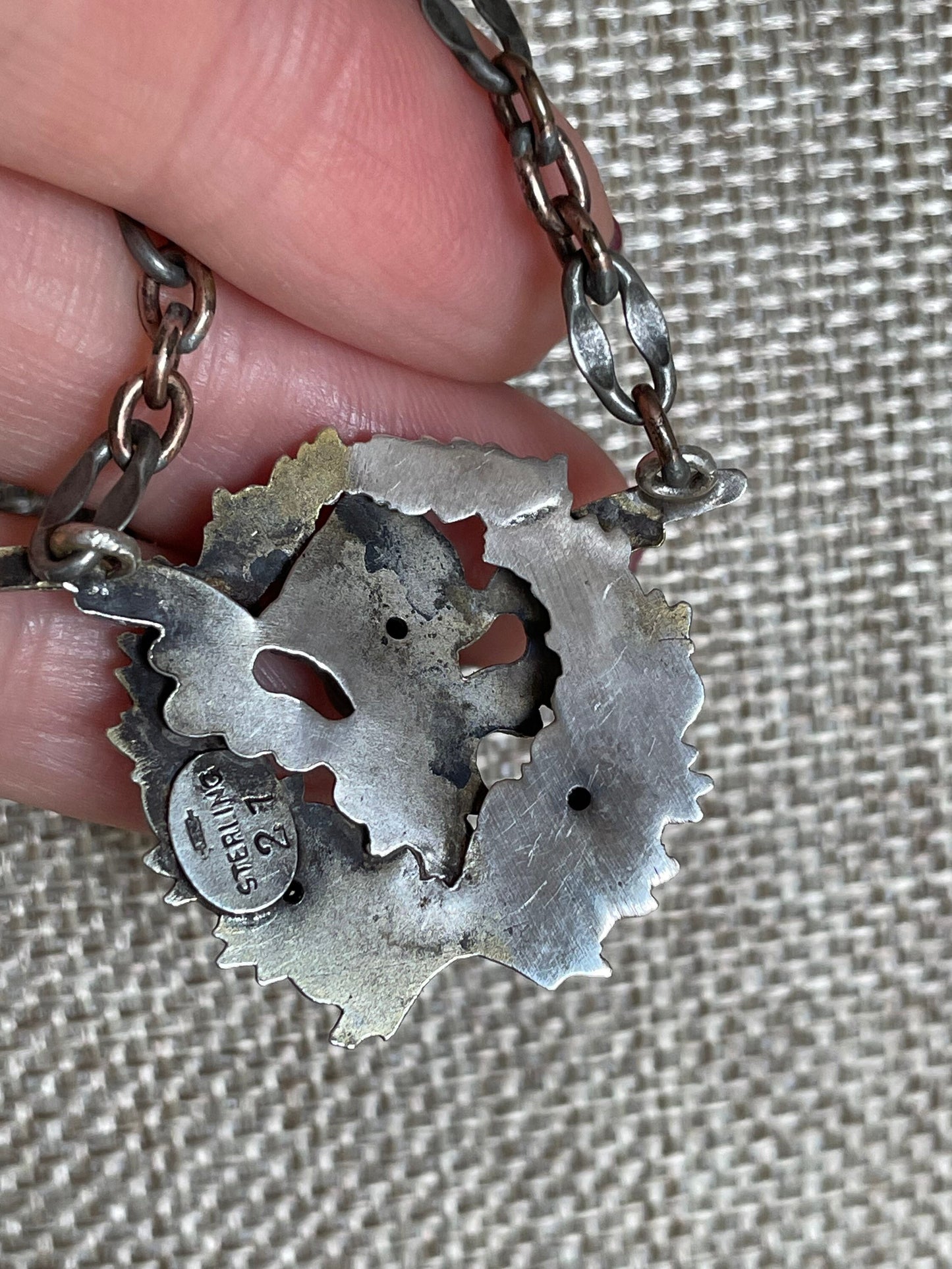 Antique Kerr Angel Cupid Pendant with Simulant Ruby