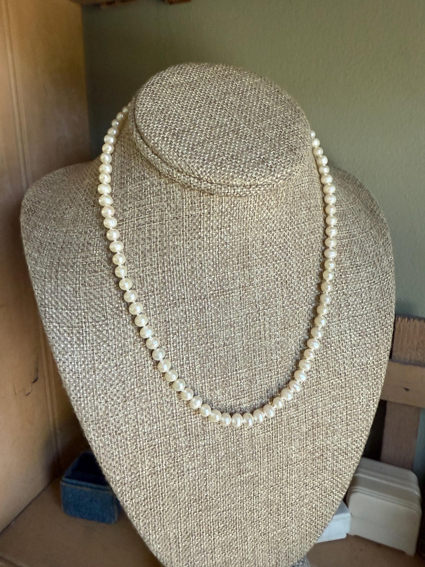 A Strand of Cultured Pearls Hand Knotted with 14K Yellow Gold Clasp