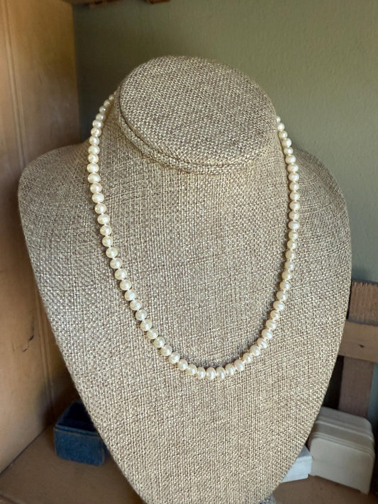A Strand of Cultured Pearls Hand Knotted with 14K Yellow Gold Clasp
