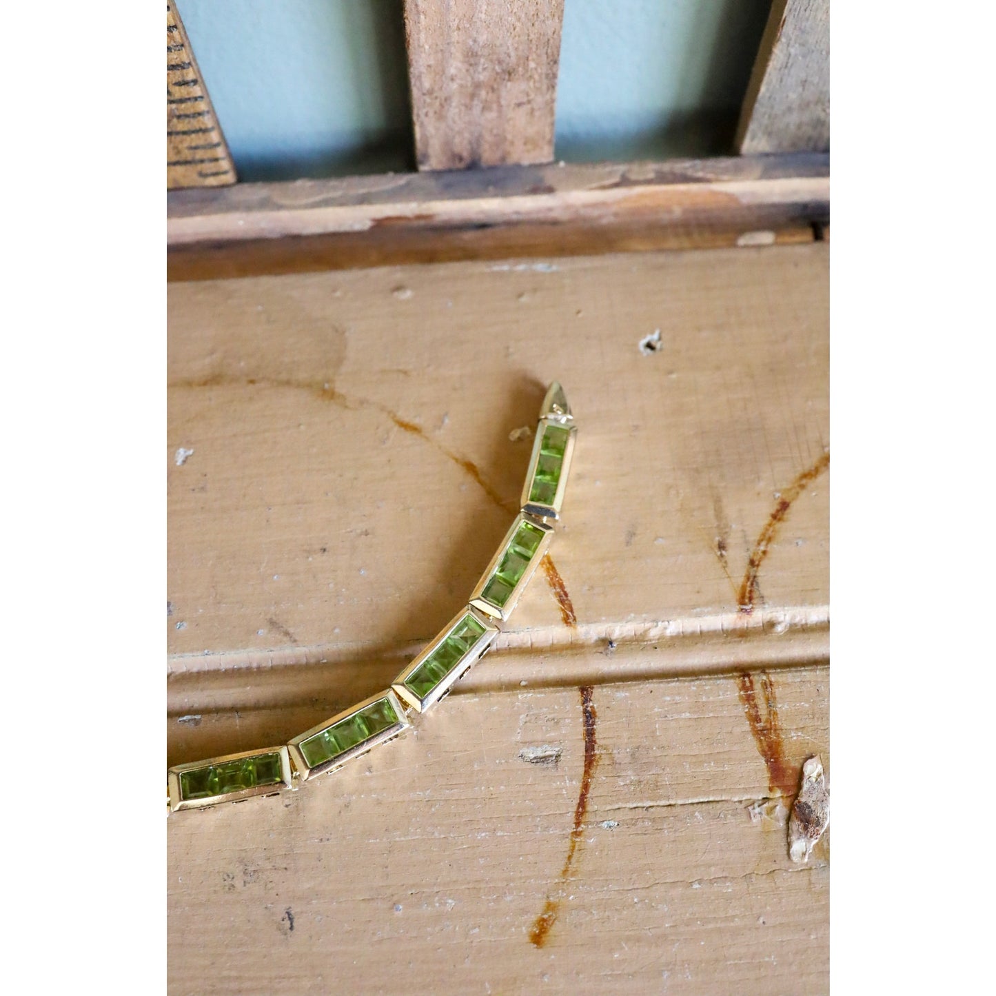 A Vintage 14K Yellow Gold Channel Set Square Set Peridot Bracelet