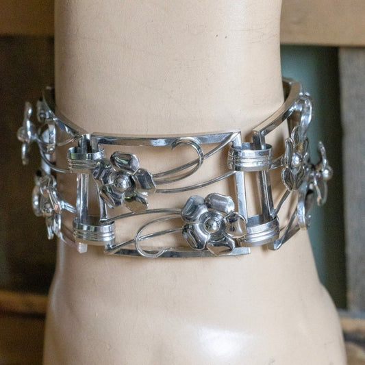 A late 1940's Harry S. Bick & Son Sterling Silver Floral Link Bracelet