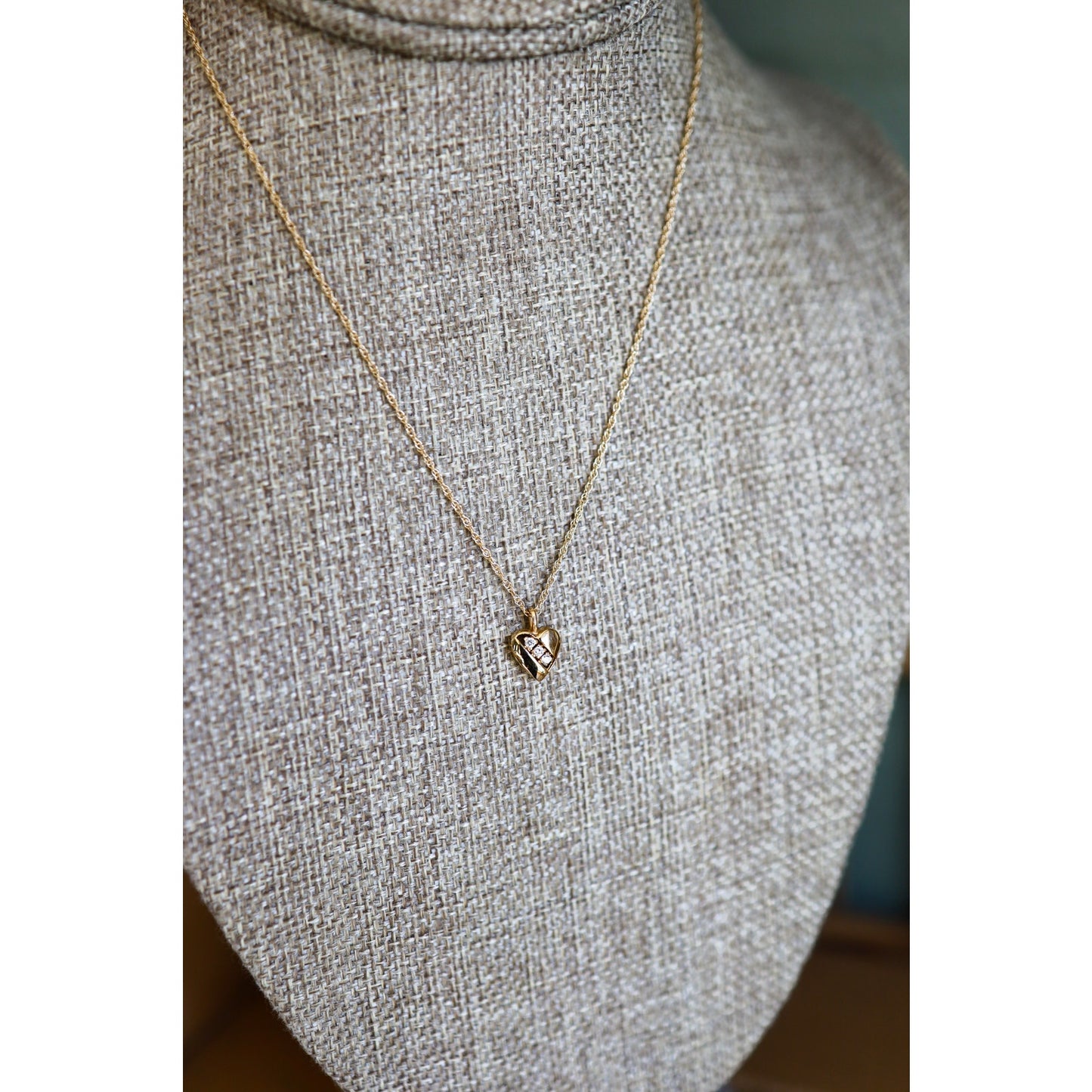 A Vintage 14K Heart Pendant Set with Diamonds on a 14K Yellow Chain