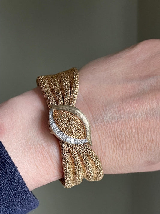 An Exceptional Mid Century Mesh 14K Yellow Gold Longines Surprise Watch
