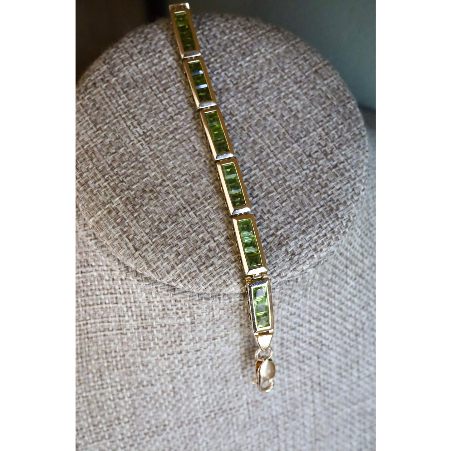 A Vintage 14K Yellow Gold Channel Set Square Set Peridot Bracelet