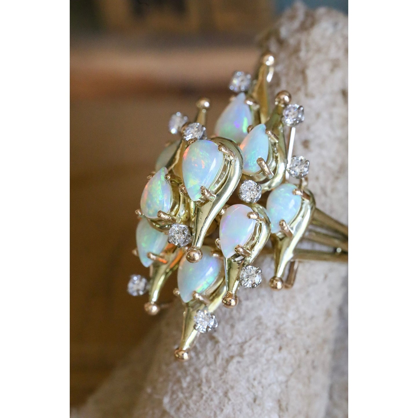 A Fine 1960's Jack Gutschneider 14K Opal and Diamond Cocktail Ring