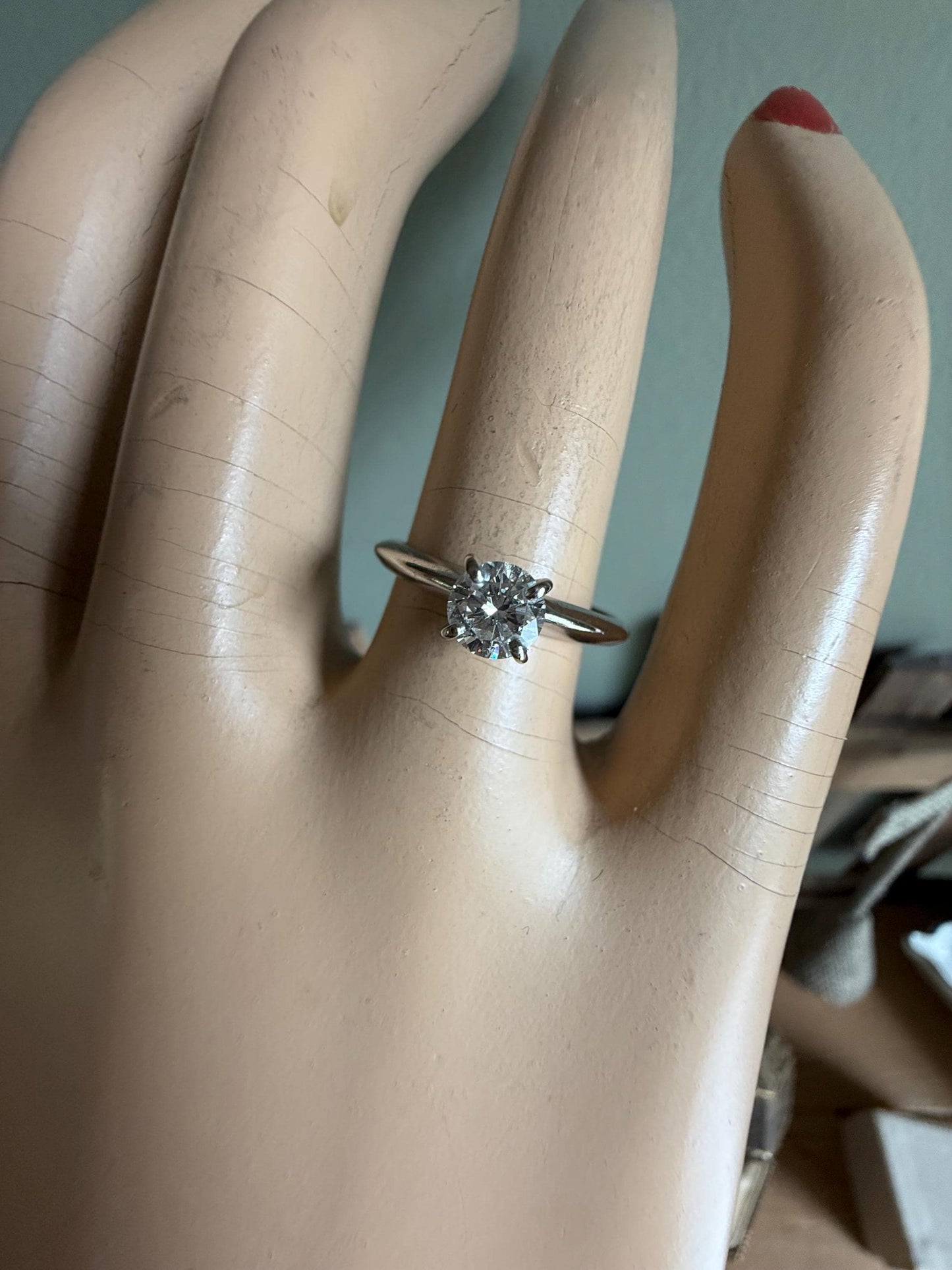 A GIA certified .42 ct Round Brilliant Cut Natural Diamond in 14K White Gold