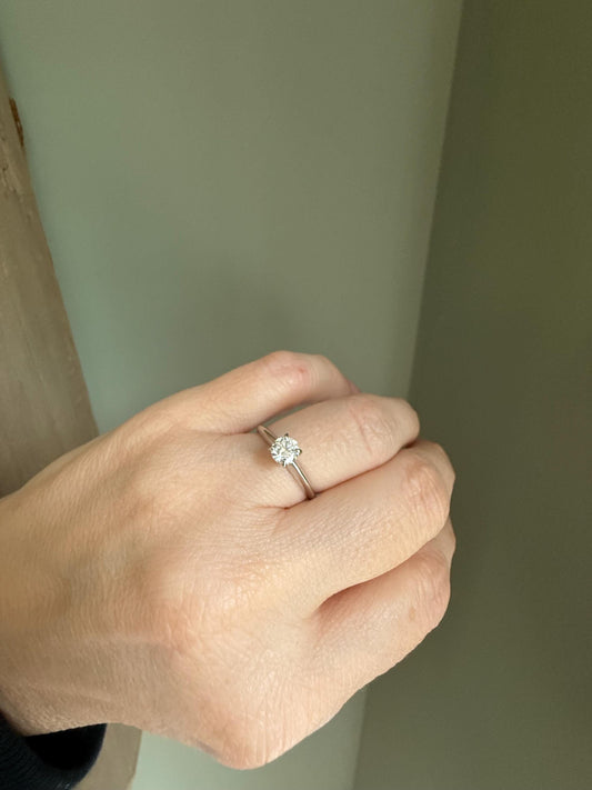 A GIA certified .42 ct Round Brilliant Cut Natural Diamond in 14K White Gold