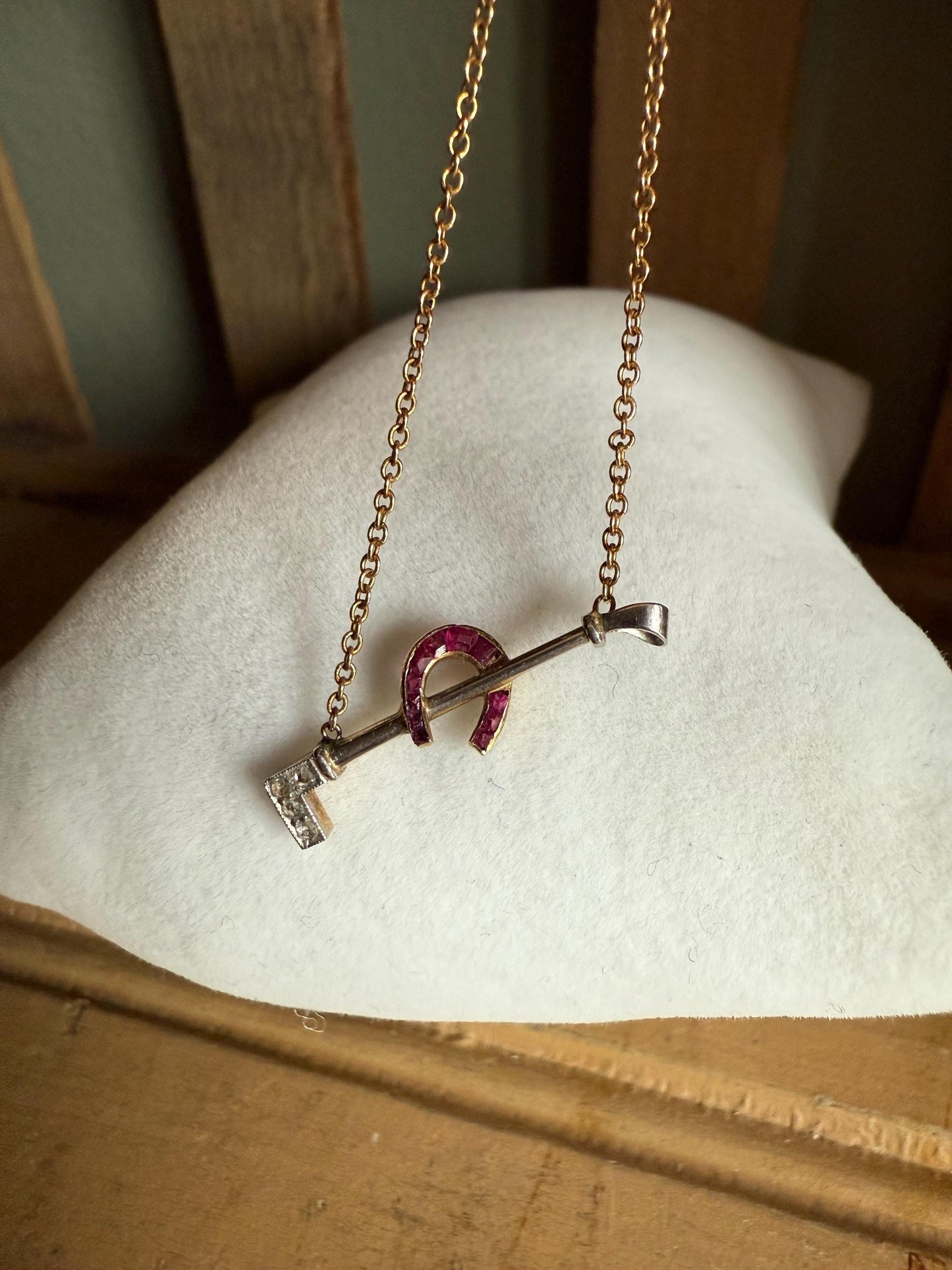 c1930 14K Yellow and White Gold Horse Crop and Lucky Ruby Set Horseshoe Necklace