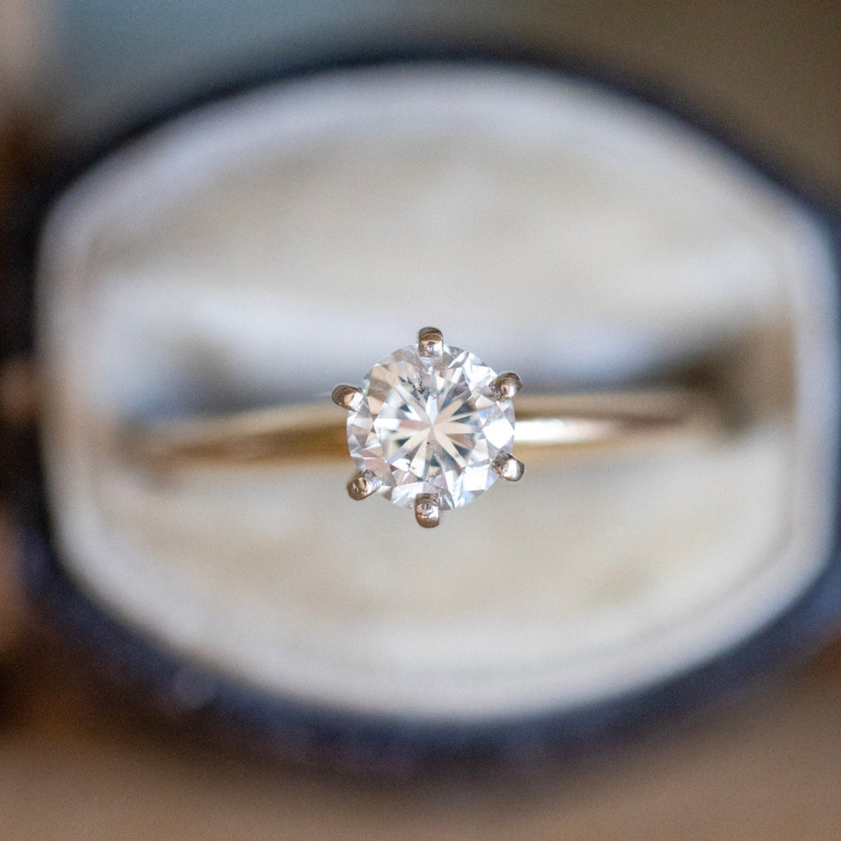 A Classic Vintage Natural Round Brilliant Cut Diamond Ring