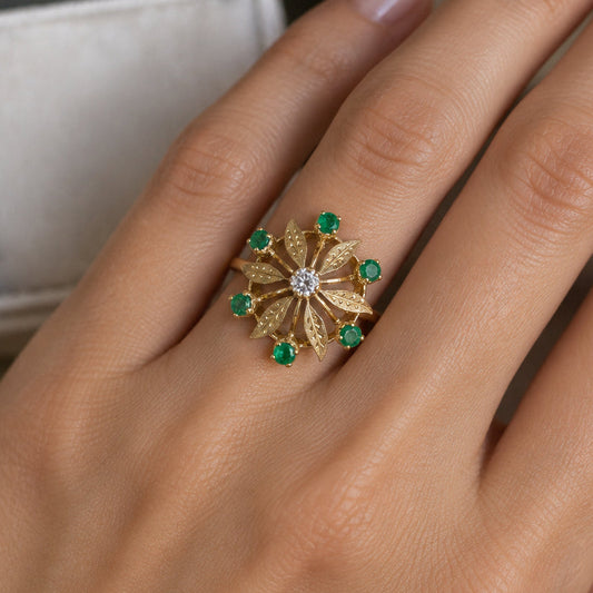 c1960 Vintage 18K Yellow Gold Natural Emerald and Diamond Pinwheel Cocktail Ring